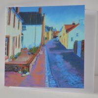 card with a pastel of old whitewashed houses