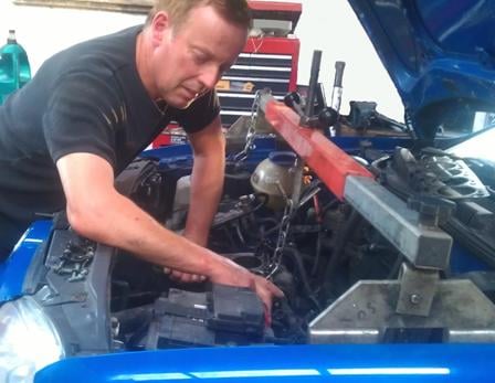 Nick of NC Motors removing an engine at his workshop