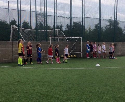 Children in football coaching class with Penistone Football Coaching