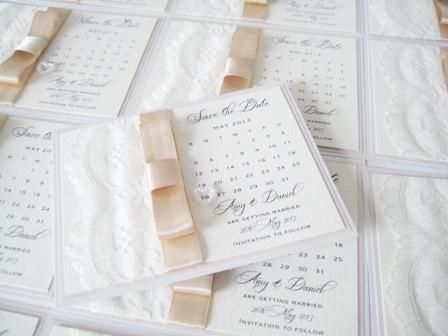 Blush and ivory save the date card with champagne bow