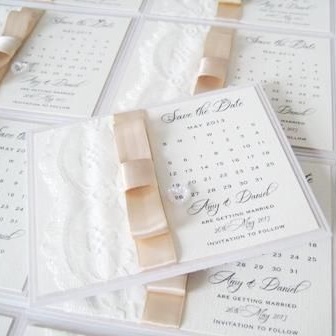 Save the date cards with lace and bow