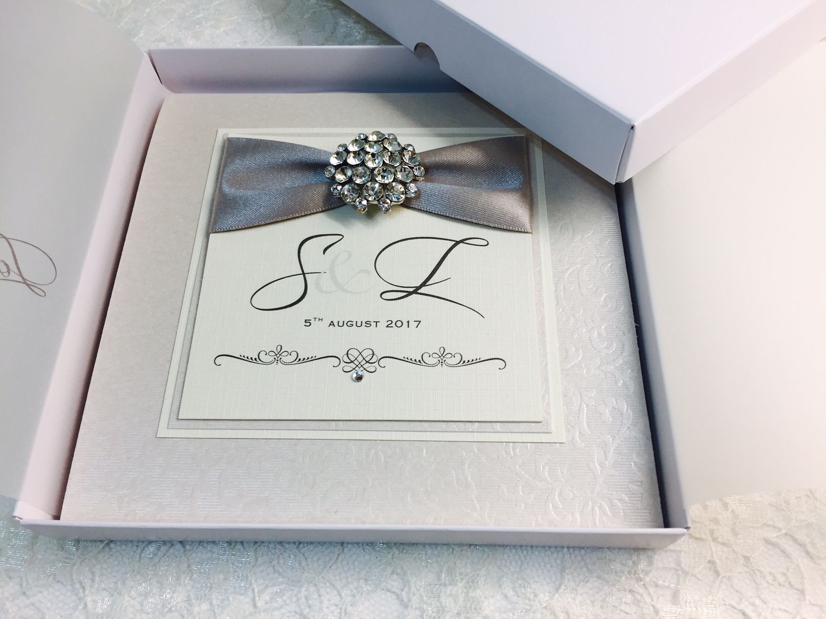 Monogram boxed wedding invitations with initials
