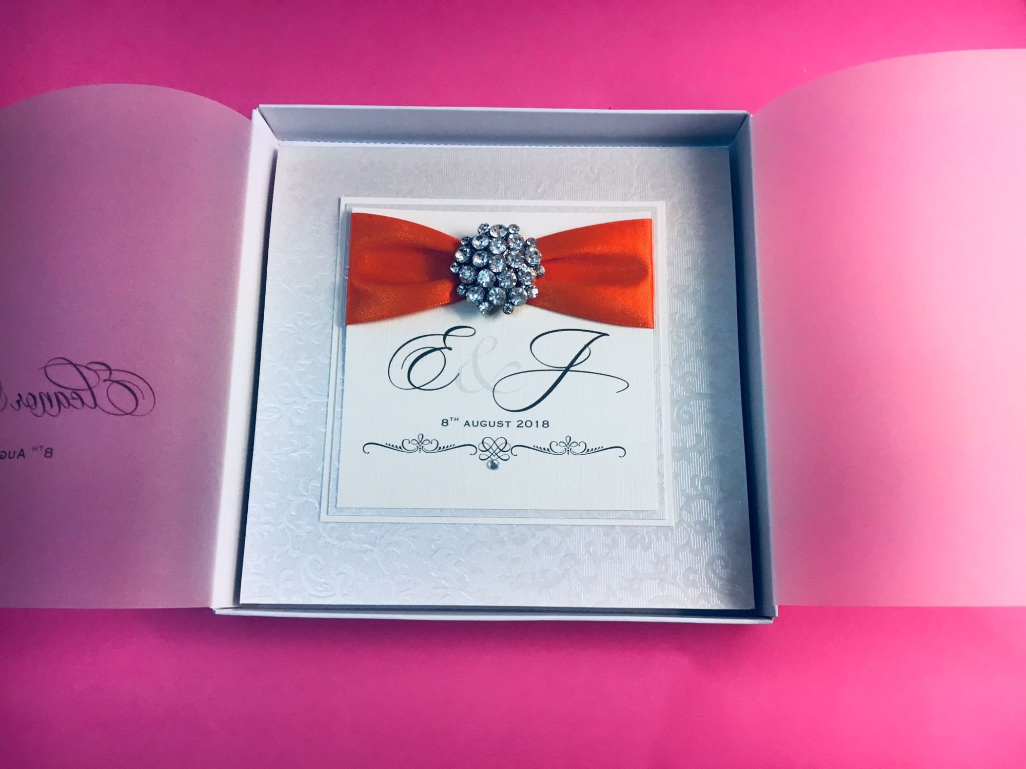 Boxed monogram invitation pocket style with diamante brooch