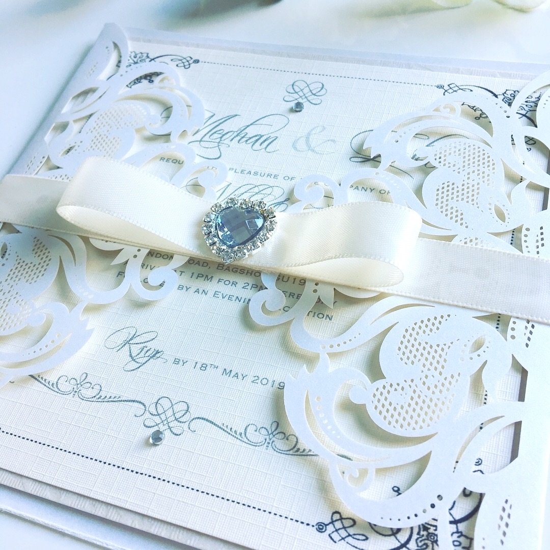 Laser Cut Wedding Invitation Sample with Bow and Crystal Brooch