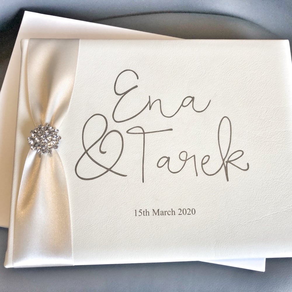 Personalised leather guest book with diamante brooch