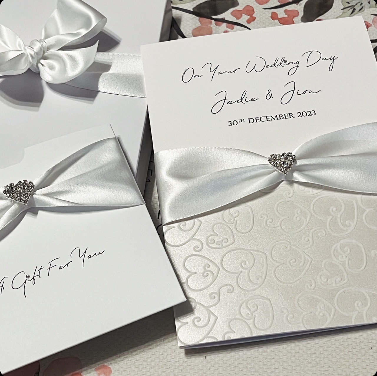 White wedding card with money wallet and gift box