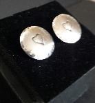 Handcrafted silver cufflinks with hearts