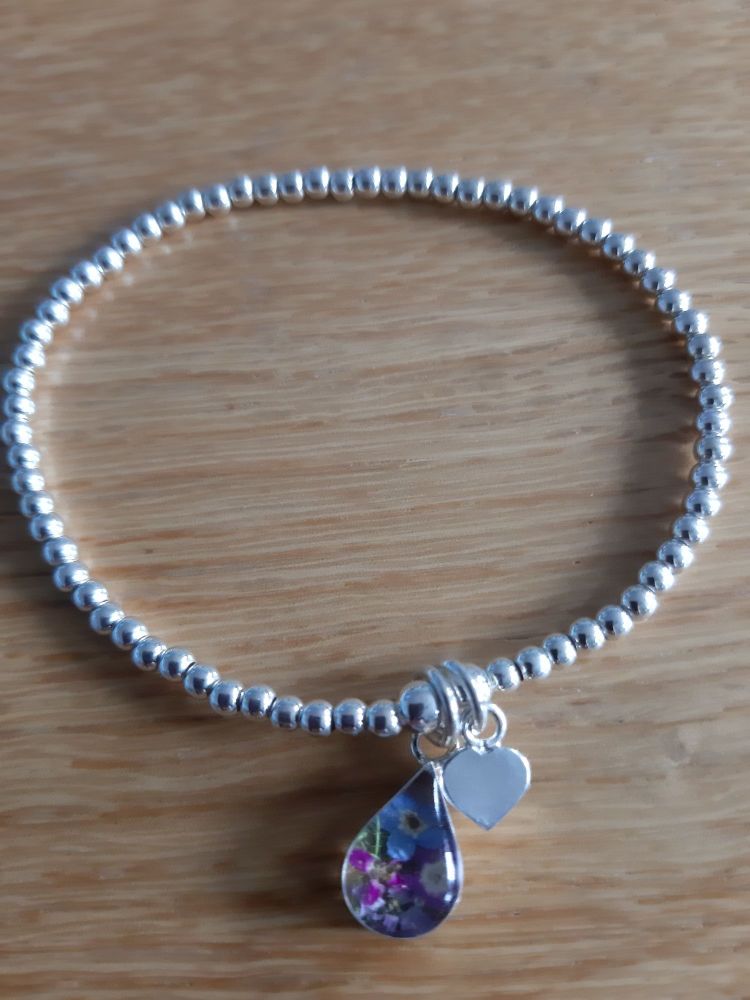 Silver beads and real flower bracelet