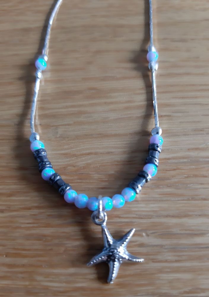 Pretty silver and opal starfish necklace