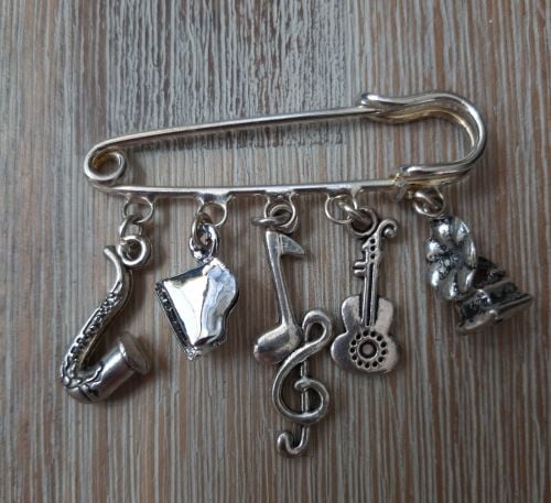 Hobby brooch for a musician or music lover 