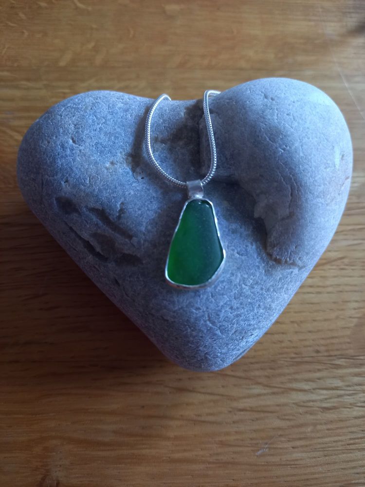 Green Seaglass pendant (chain purchased seperately)  with silver bezel surr