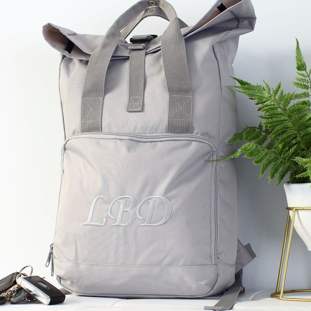 <!-- 082--> Embroidered Roll-top Backpack