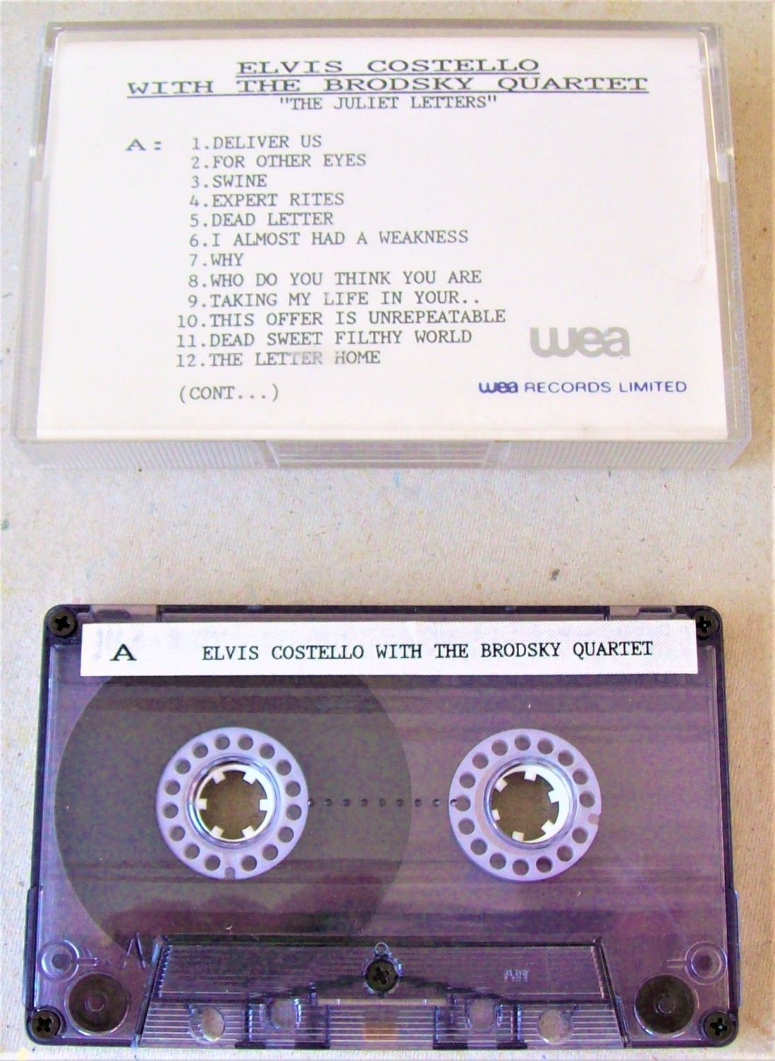 ELVIS COSTELLO U.K. WEA RECORD COMPANY PROMO CASSETTE TAPE 'JULIET LETTERS'