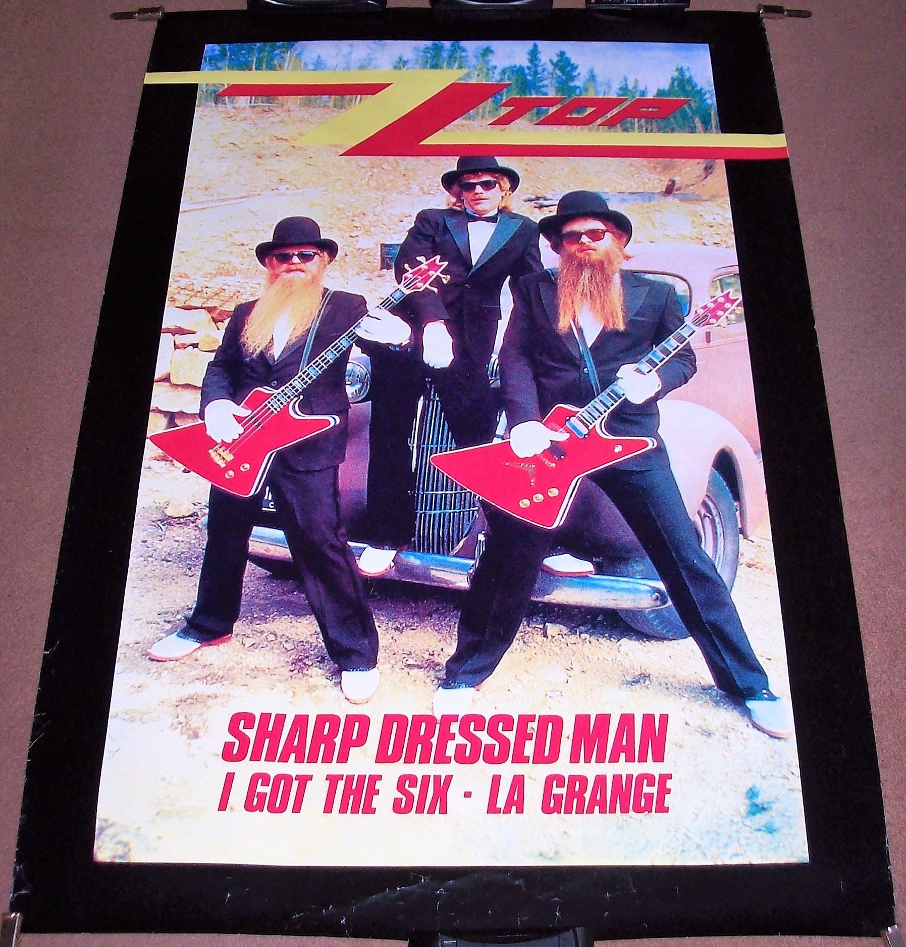 ZZ TOP U.K. RECORD COMPANY PROMO POSTER FOR THE RELEASE OF THE SINGLE âSHARP DRESSED MANâ 1983 1.jpg