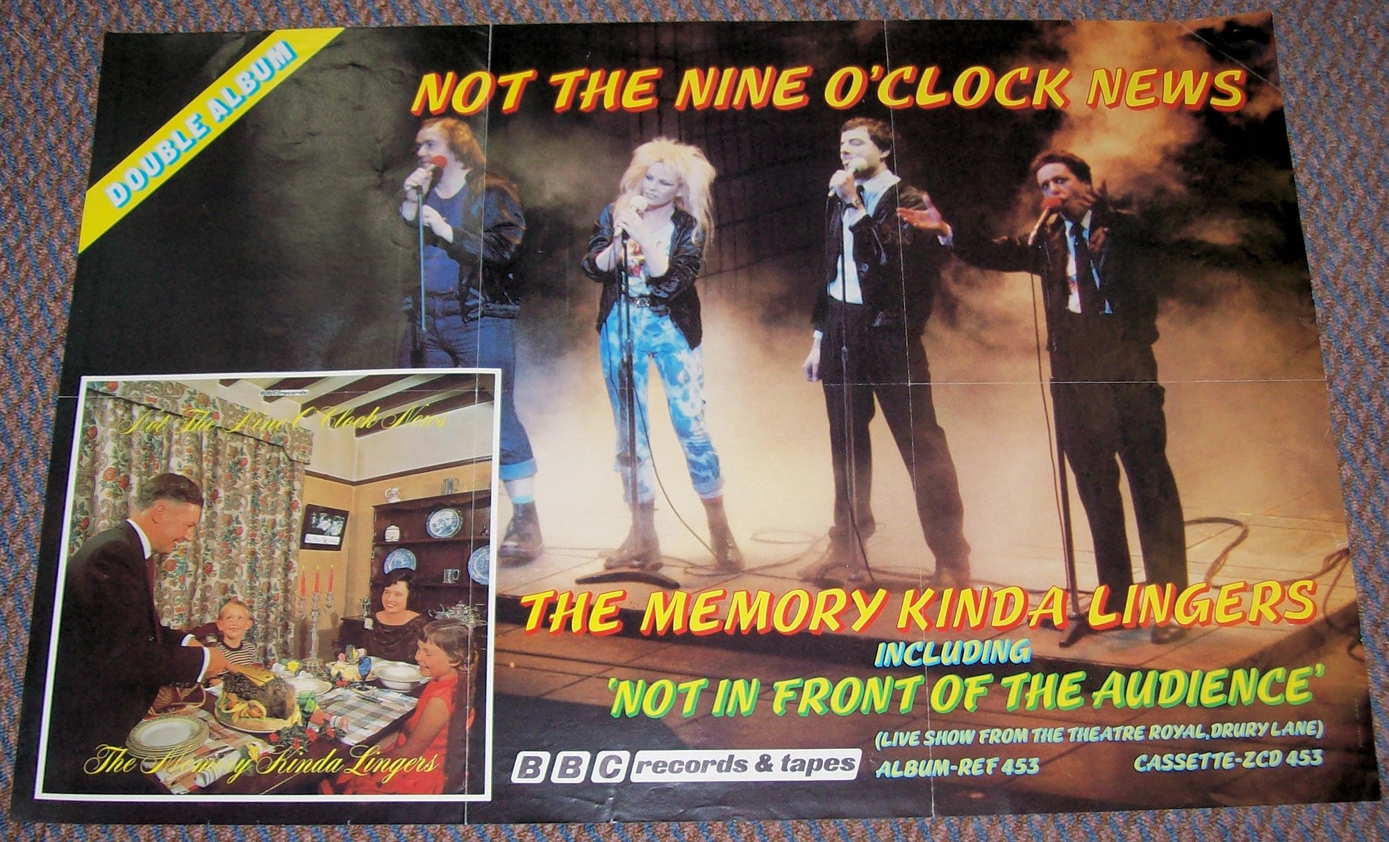 NOT THE NINE O'CLOCK NEWS U.K. RECORD COMPANY PROMO POSTER FOR THE ALBUM 'THE MEMORY KINDA LINGERS' IN 1982.JPG