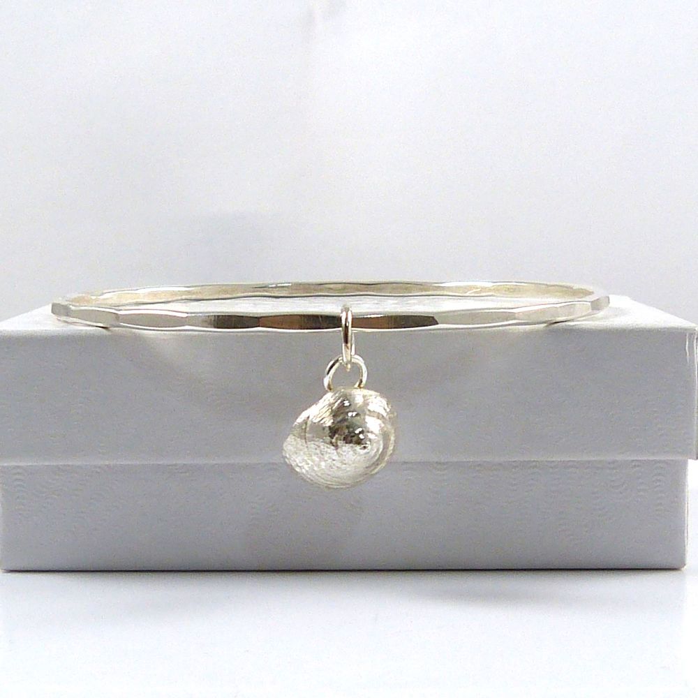 Sterling Silver Hammered Bangle with Tiny Periwinkle Shell Charm 