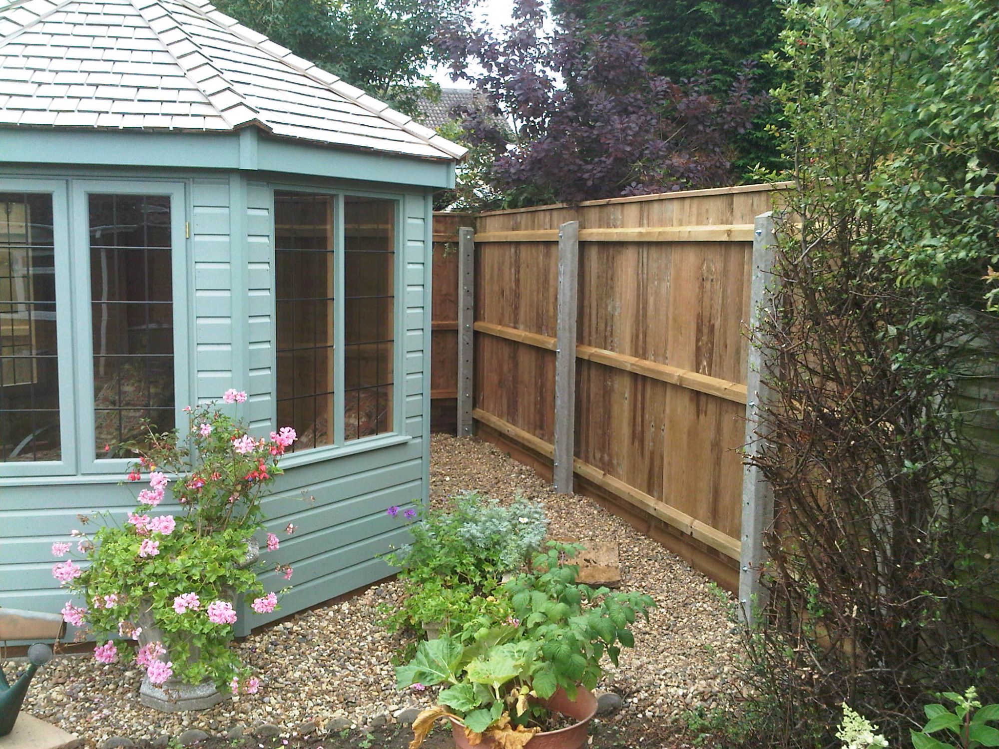 Concrete Posts & Feather Edge Fencing