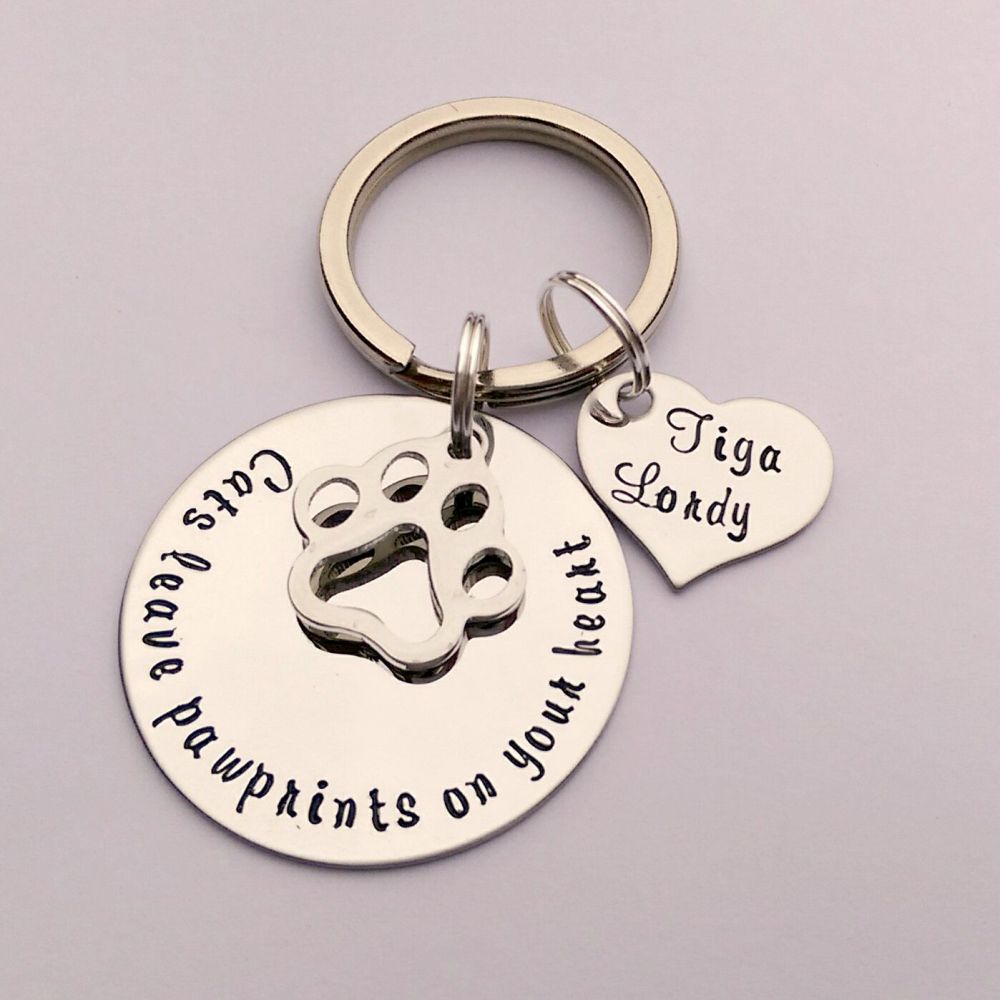 Cats / Dogs leave pawprints on your heart personalised keyring
