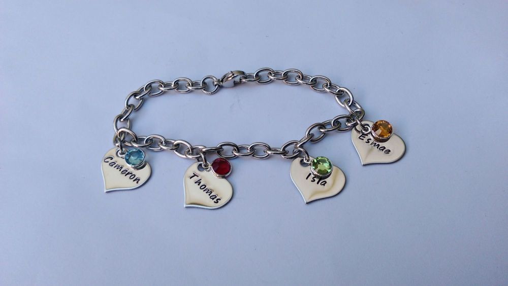 Hand Stamped personalised stainless steel charm bracelet with name and birthdate charms
