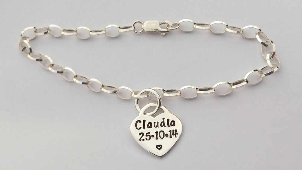 Sterling silver bracelet with hand stamped sterling silver 'lock' heart charm