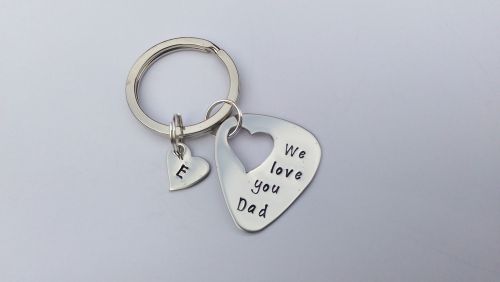 Hand stamped personalised guitar pick plectrum keyring with heart cutout
