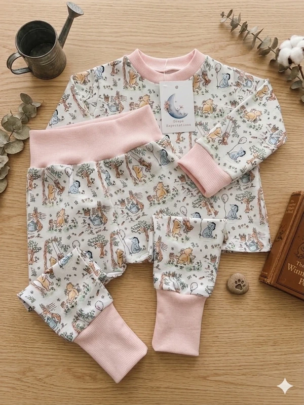 Pooh lounge suit with pink trim