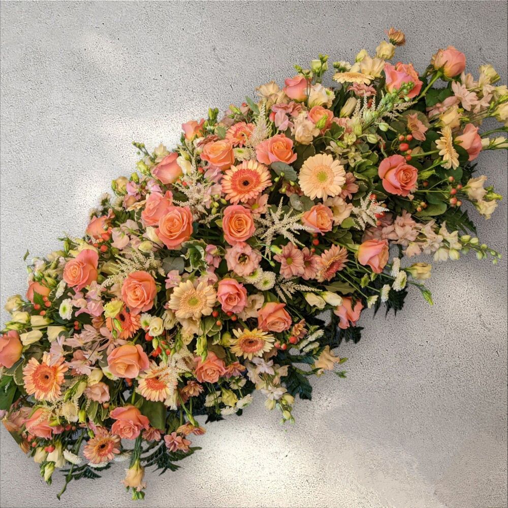 Peaches and cream coffin spray