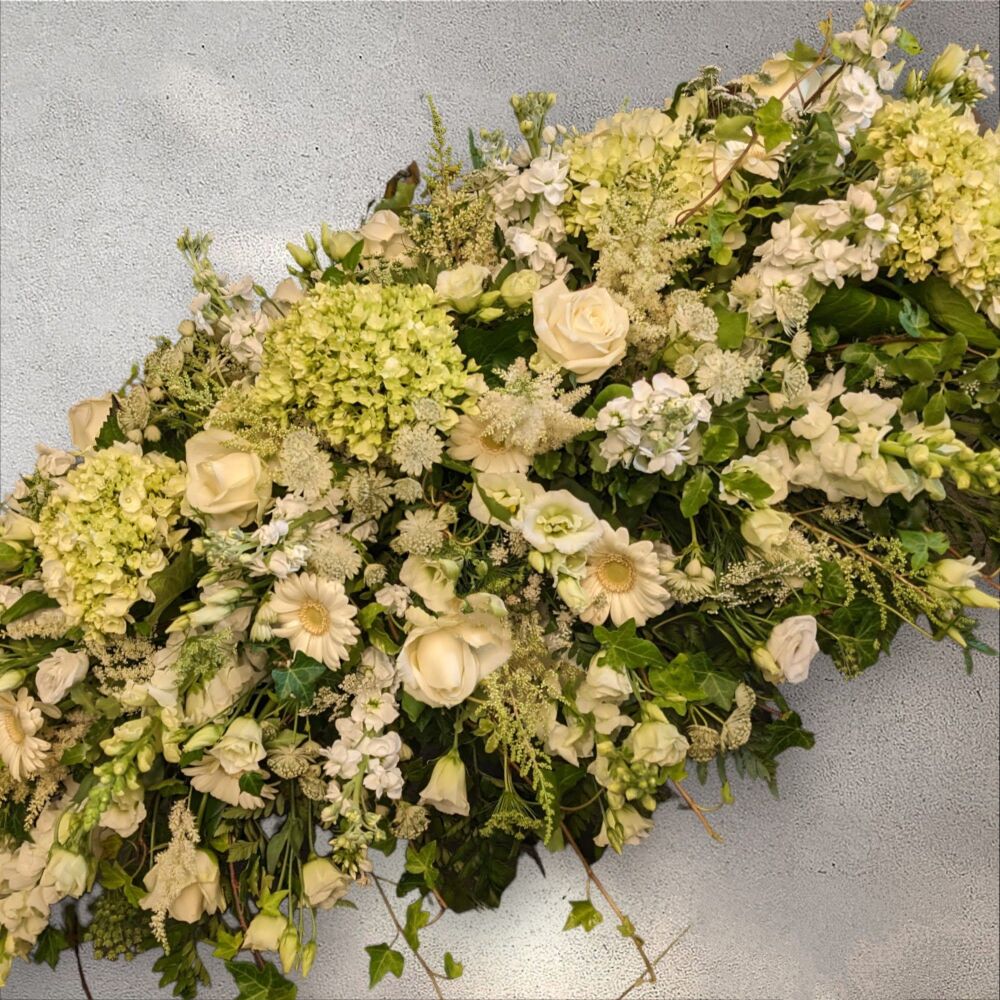 Creams and Greens coffin spray with Hydrangeas