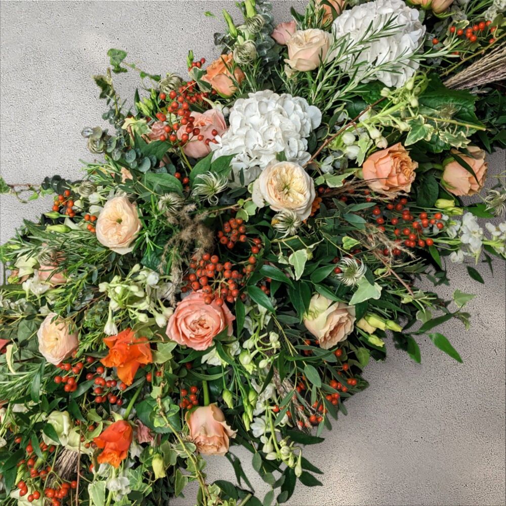 Peach and oranges natural double ended coffin spray