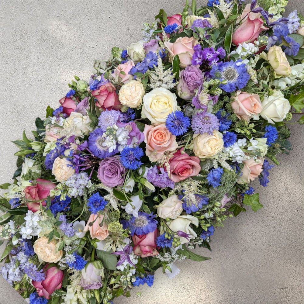 Summer pinks and blues coffin spray