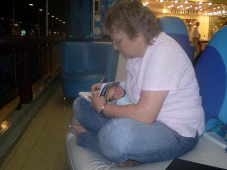 anita translating book in airport santiago chile