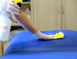 Cleaning Doctors Examination Bed