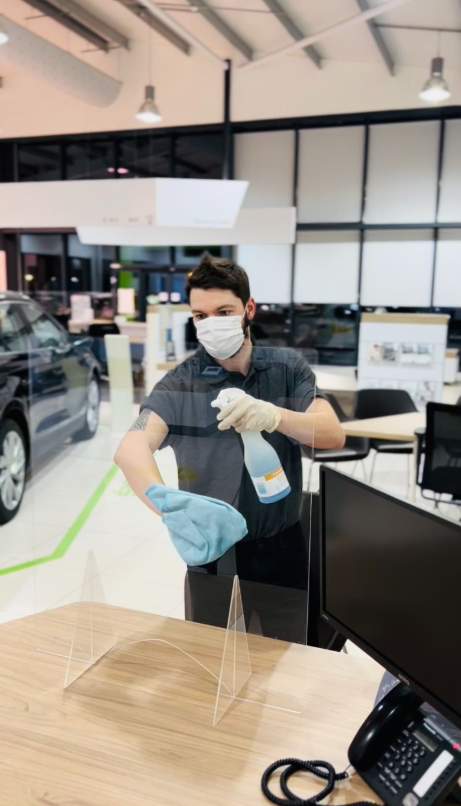 staff-cleaning-showroom-glass-lincoln
