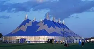 Large blue big top festival tent at Lincolnshire Showground during Awaken event, supported by Clean Sweep Commercial cleaning services