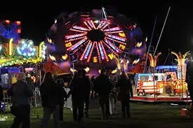 Nighttime funfair and fireworks event at Lincolnshire Showground with rides and lighting, cleaned by Clean Sweep Commercial