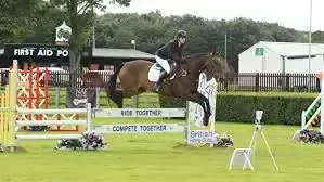 British Riding Club equestrian event at Lincolnshire Showground with horse and rider jumping hurdles â event cleaning provided by Clean Sweep Commercial
