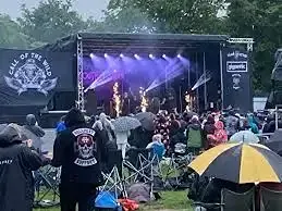 Call of the Wild rock music festival at Lincolnshire Showground with stage lights, crowd, and onsite cleaning support