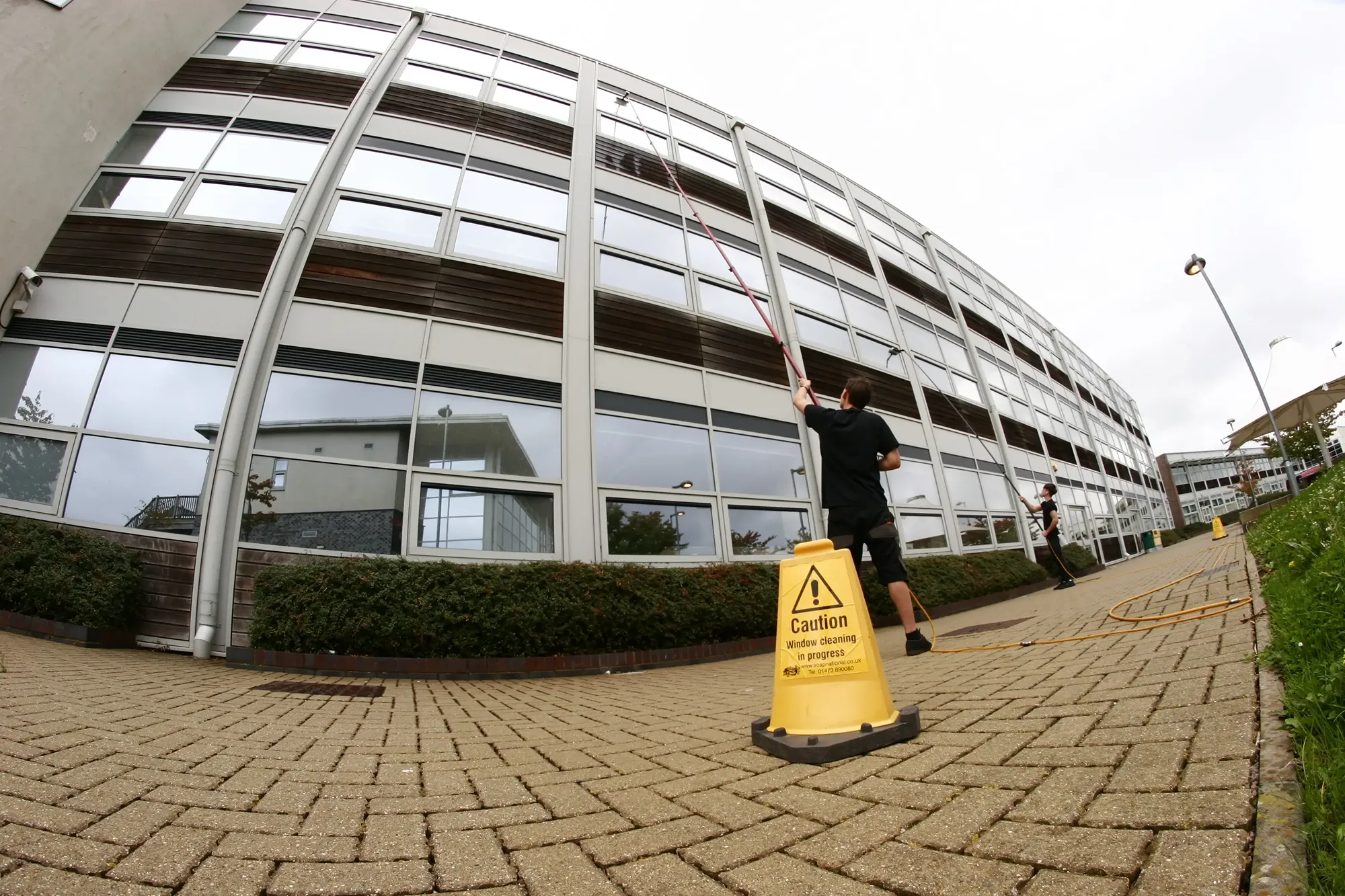 team cleaning windows in lincoln