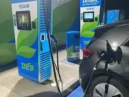 Clean EV charging bays at Lincoln service station during night operation