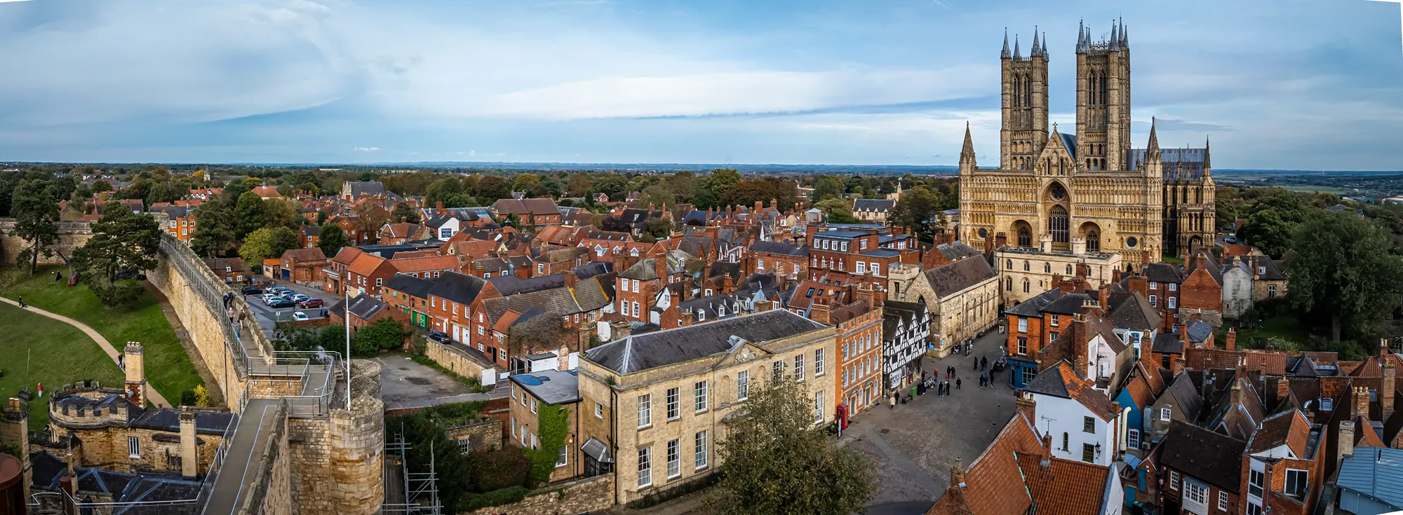 Panoramic aerial view of Lincoln Cathedral and Lincoln city centre skyline in Lincolnshire, representing local office cleaning services in Lincoln by Clean Sweep Commercial