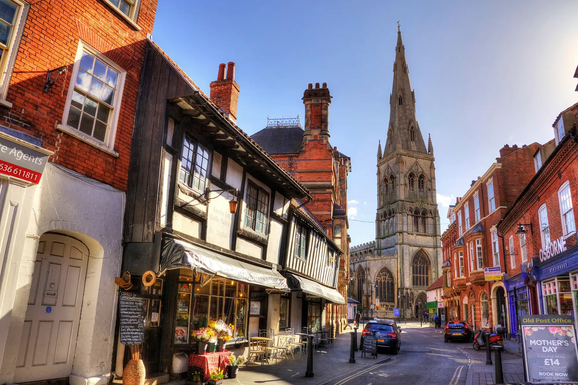 Street view of Newark town centre with historic buildings and Newark Parish Church, representing local office cleaning services in Newark by Clean Sweep Commercial