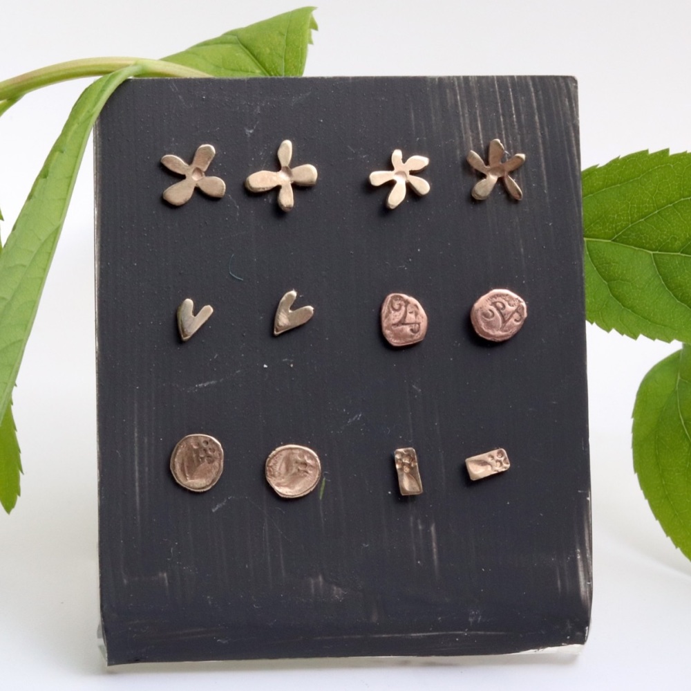 Tiny gold stud earrings
