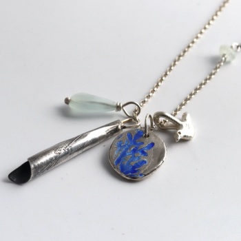 Long Silver Charms Necklace with Blue Enamelled Nugget, Silver Bird, Silver Pendant and Gems