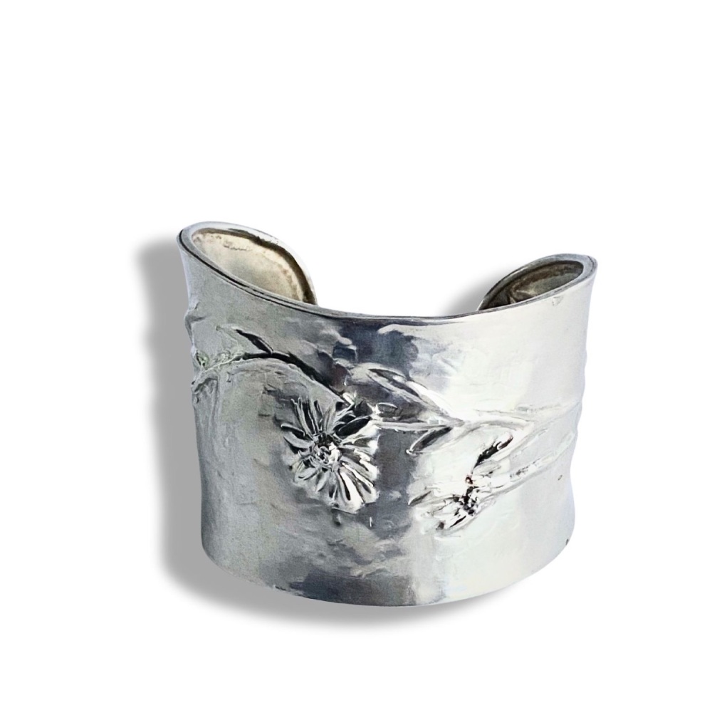 Silver Cuff with Erigeron Daisies made by chasing and repousse