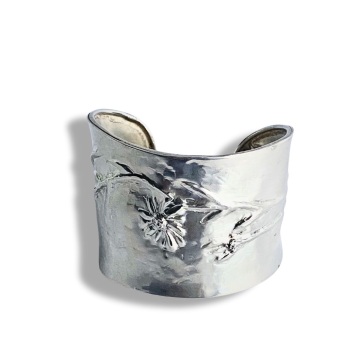 Silver Cuff with Erigeron Daisies made by chasing and repousse