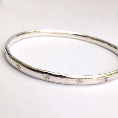 Silver Bangle with Star Stampings.