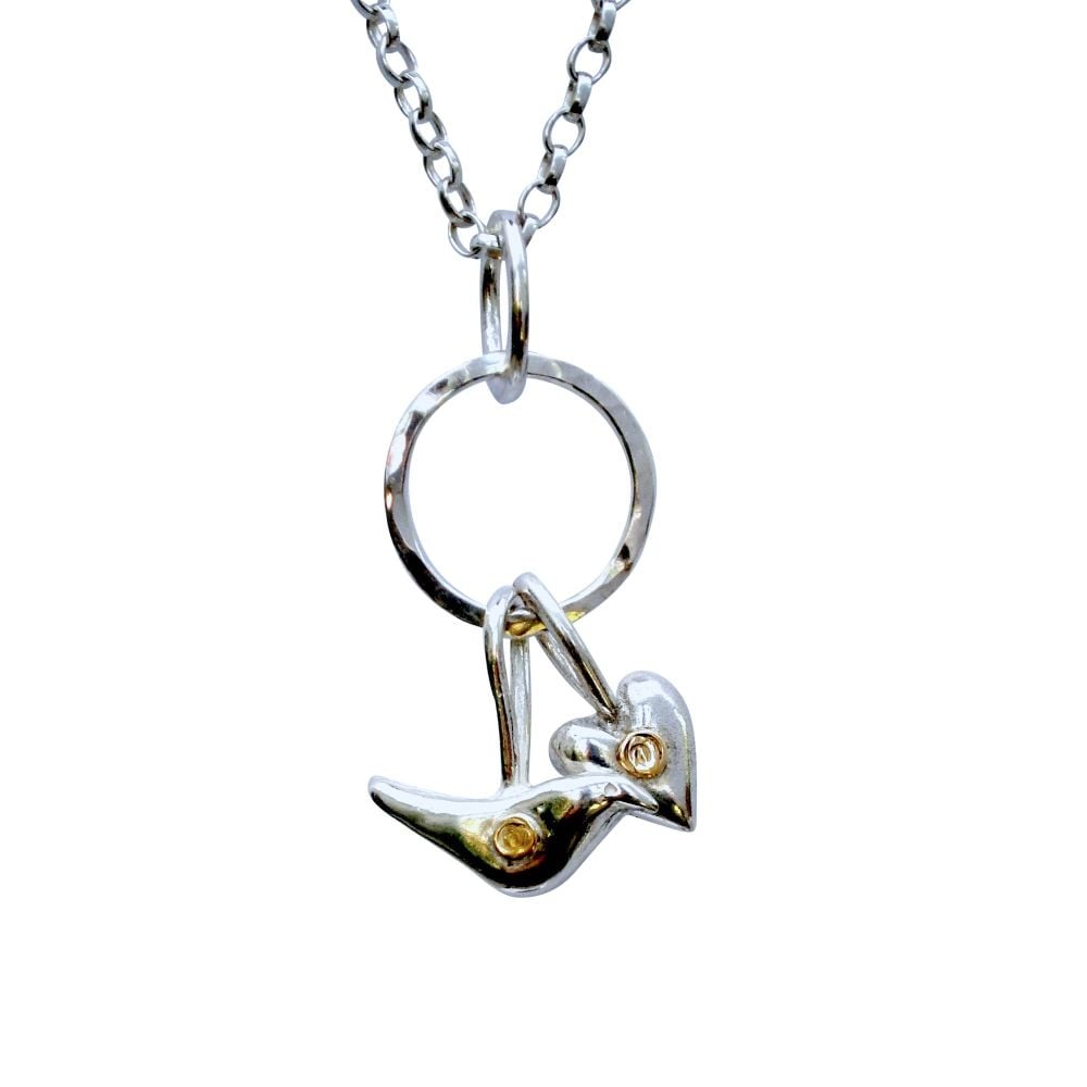 Bird and Heart with gold necklace