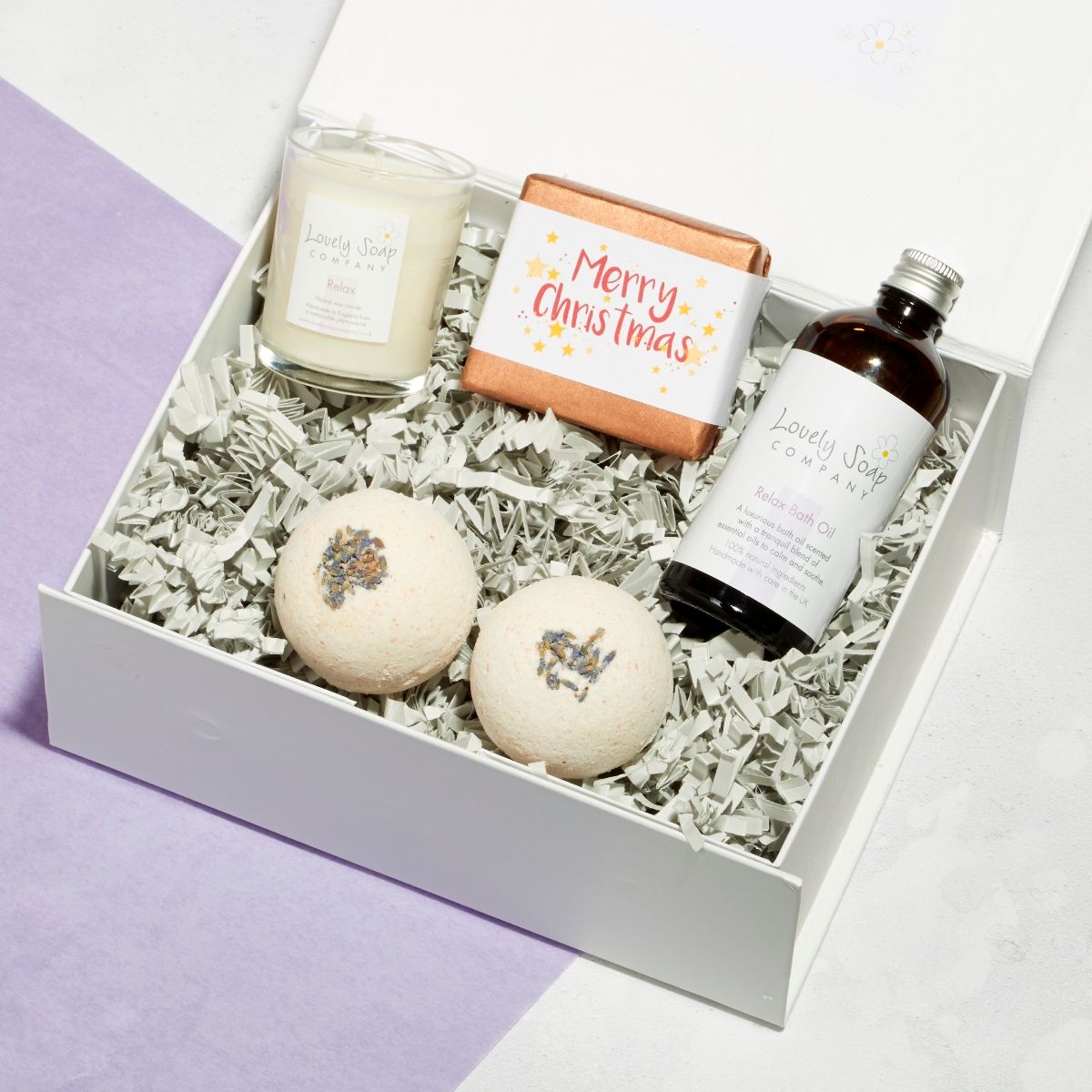 relaxing xmas pamper hamper with lavender bath bombs, relaxing bath oil, lavender candle, lavender soap