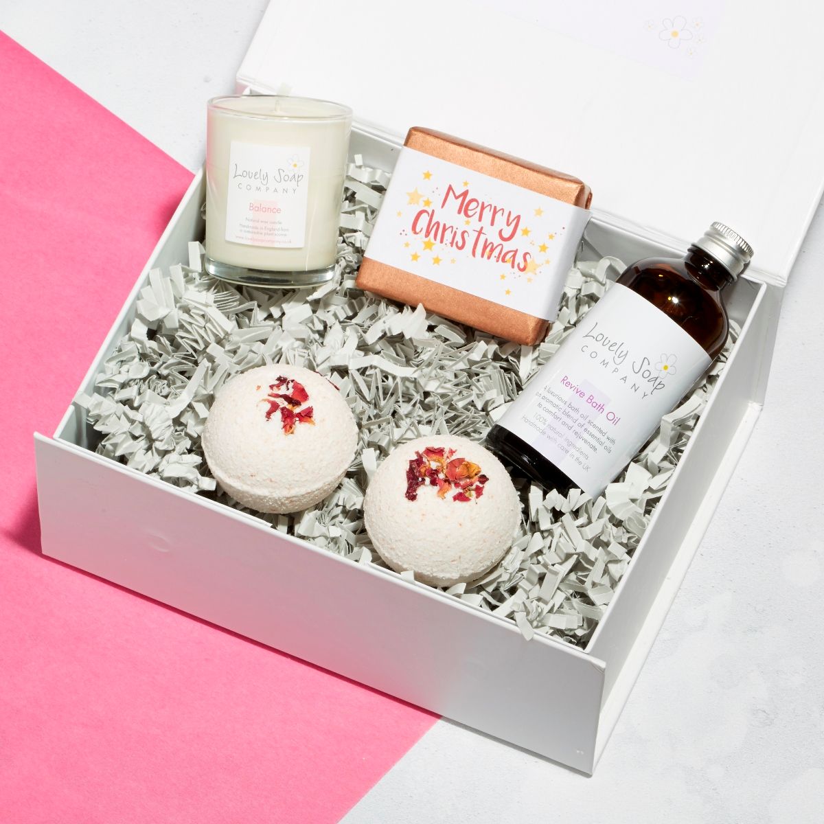 Revive xmas pamper hamper with rose geranium bath bombs, balance candle, revive bath oil and lavender soap