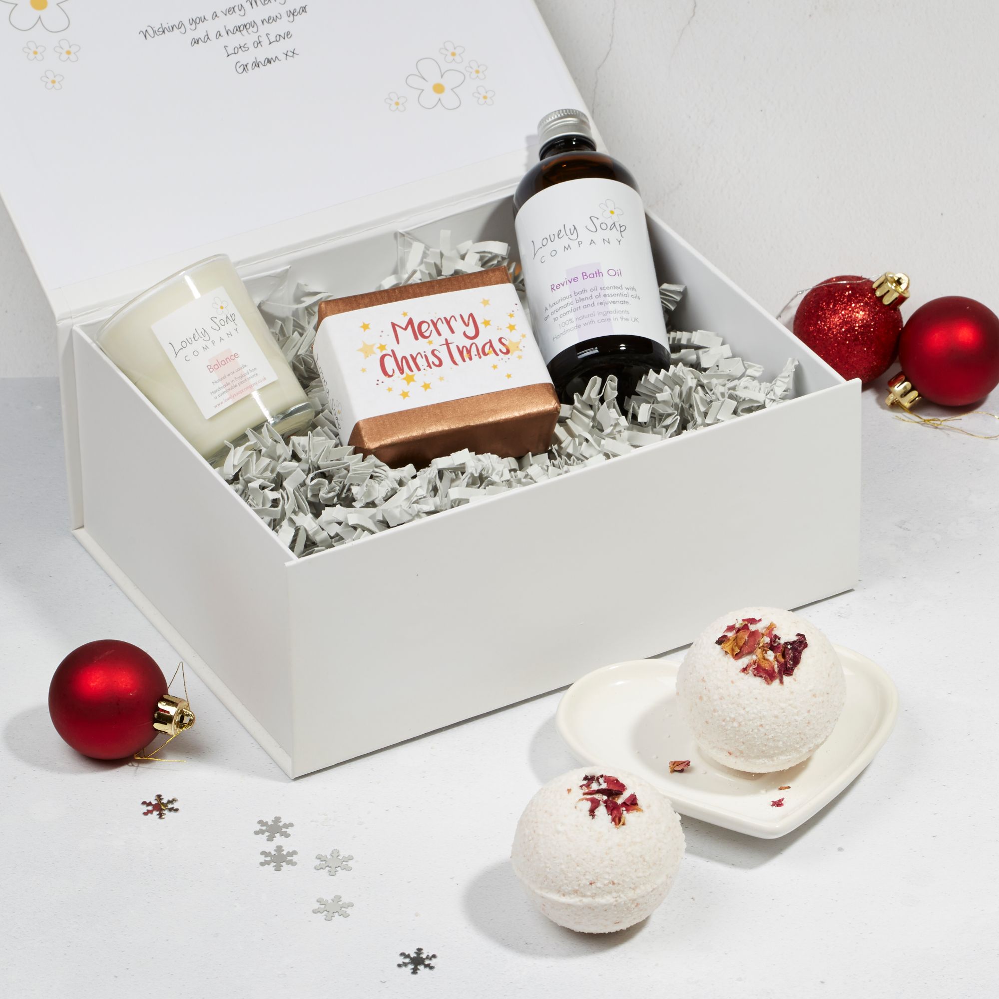 Revive xmas pamper hamper with rose geranium bath bombs, balance candle, revive bath oil and lavender soap